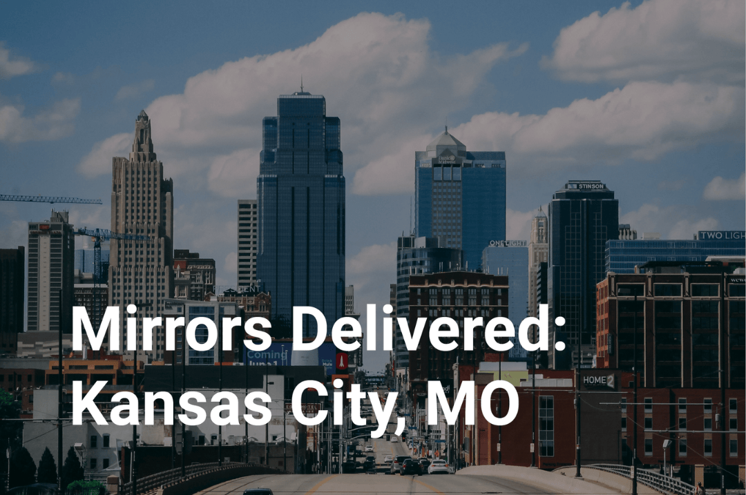 City skyline with text overlay 'Mirrors Delivered: Kansas City, MO'