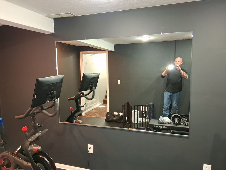 Mirrors Delivered home gym mirror wall installation in Olathe, KS
